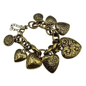 Gold Tone Heart And Coin Charm Bracelet